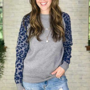 Womens's LEOPARD PRINT SLEEVE SWEATER NWT